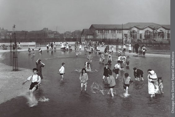 A photograph of some children playing in the wading pool at McGuane Park